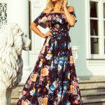 194-3 Długa suknia z hiszpańskim dekoltem - czarna w kolorowe kwiaty-1