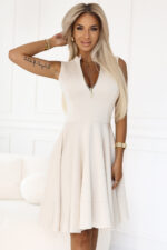 573-3 Ekskluzywna sukienka z rozkloszowanym dołem i złotym zamkiem - BEŻOWA-1