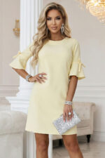 217-12 NEVA Kobieca trapezowa sukienka z wiązaniem na rękawkach - pastelowy żółty-5